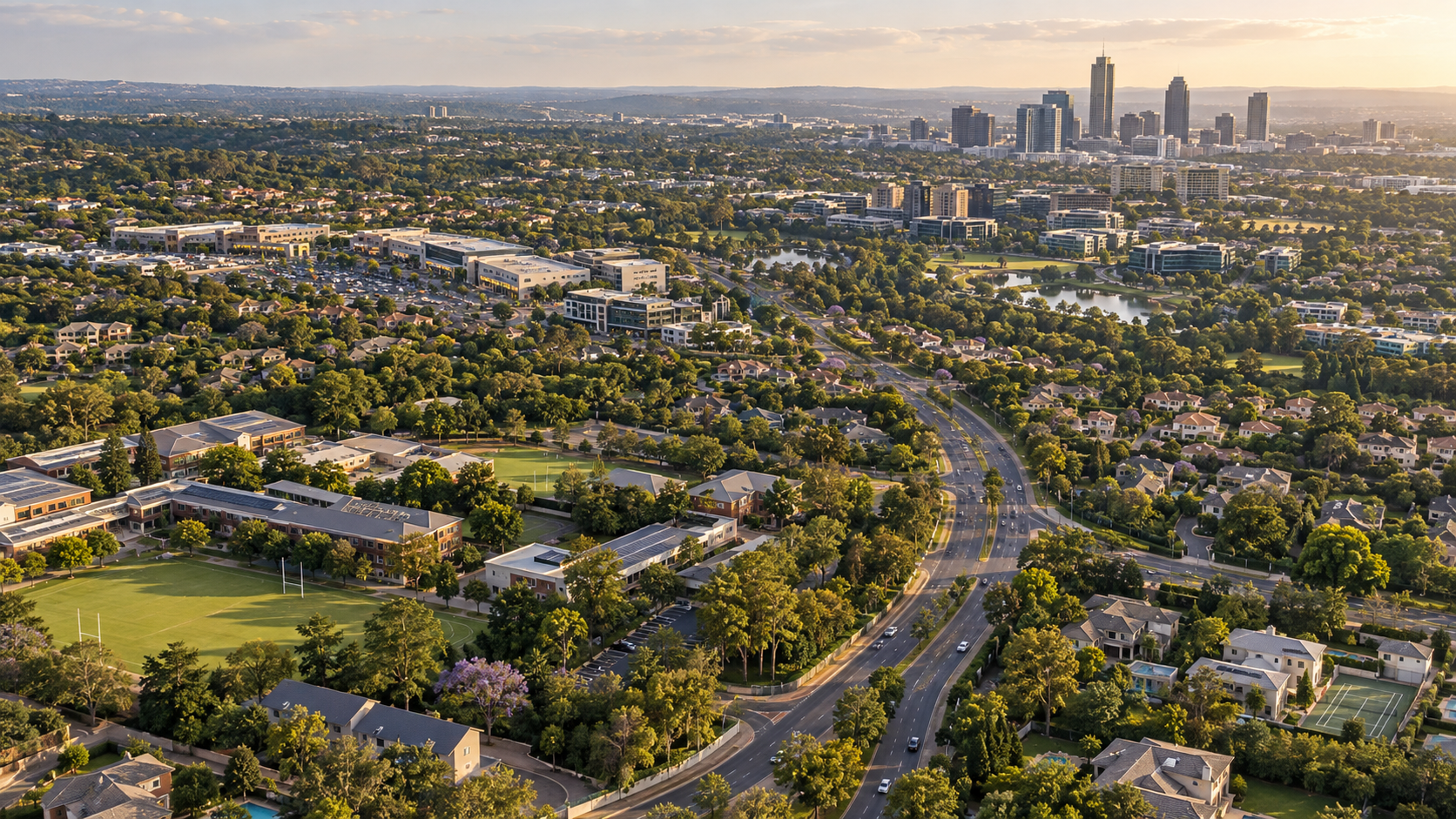 Aerial view of leafy northern Johannesburg suburbs, roads, schools and office districts